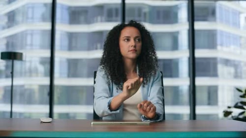 Woman Manager Using Augmented Reality Software Interface For Operating Business In Futuristic Off...