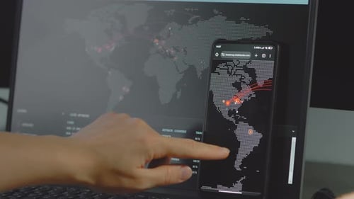 Hand Interacting with Technology Showing a Map