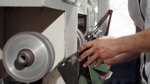 Man Working Machine in Industrial Workplace
