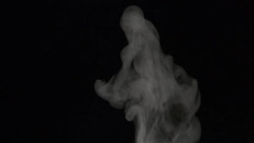 Dramatic White Steam Rising on Black Background