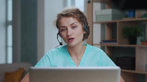Medical Doctor Woman Support Talking on Laptop in Online Clinic on Video