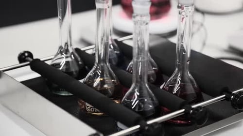 Beakers Mixing Liquids on a Laboratory Shaker