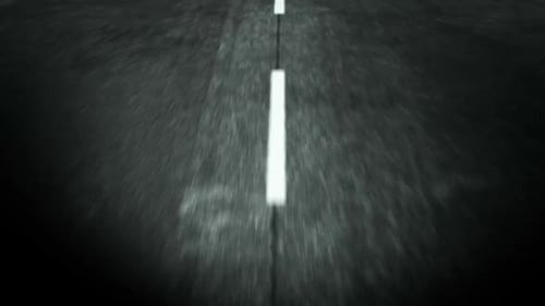 Motion blur of a road with dashed line