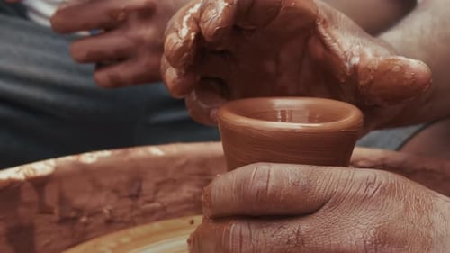 Shaping A Clay Pot In A Ceramics Workshop 22