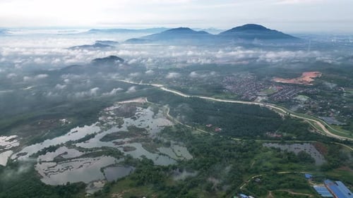 Majestic Aerial View of Mountains, River, and Farmland