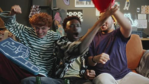 Friends enthusiastically cheering for a sports team
