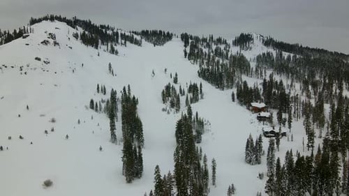 4K Drone Shot of Skiers in Ski Resort