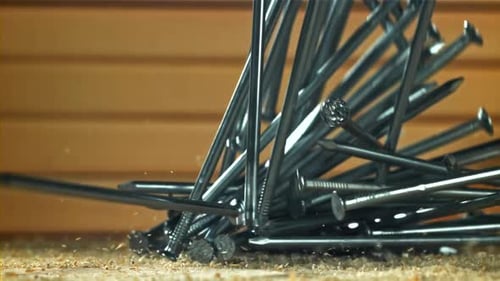 The Nails Fall on the Master's Desk Filmed on a Highspeed Camera at 1000 Fps