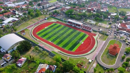 Aerial footage from top of soccer field. Football stadium. Outdoor sports