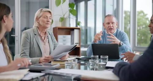 Business Team Meeting at Conference Table