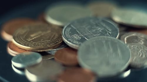 video of vintage rare coins, retro money edition, old gold, on a 360 rotating plate, 120 fps slow mo