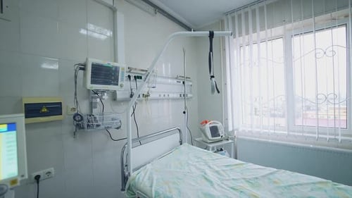 Empty Hospital Room with Medical Equipment