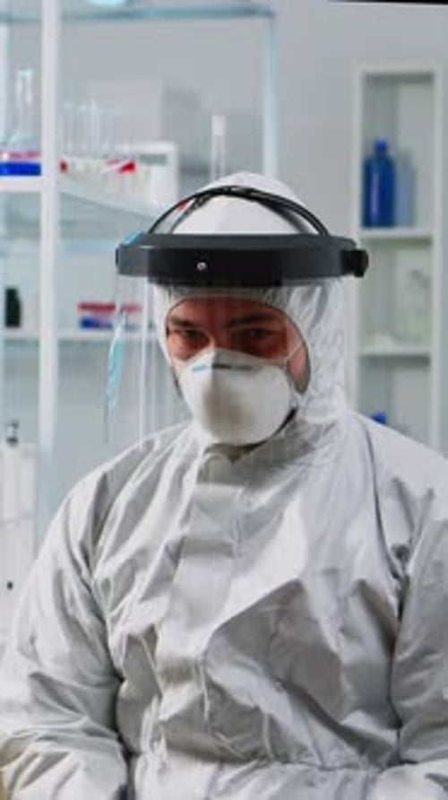Adult in Hazmat Suit in a Laboratory