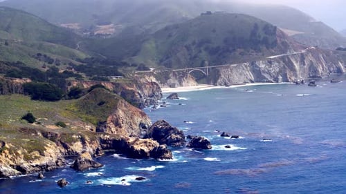 Aerial Drone Video of Big Sur Rocky Coastline with Bridge