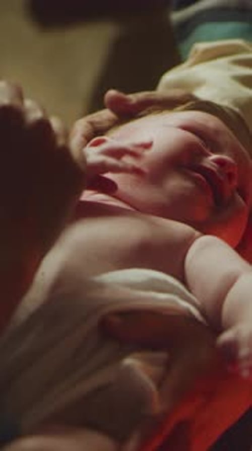 Mary and Joseph Comforting Crying Baby Jesus