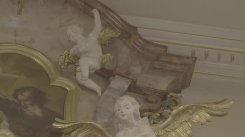 Ornate Baroque Sculpture of Winged Angels in Cathedral