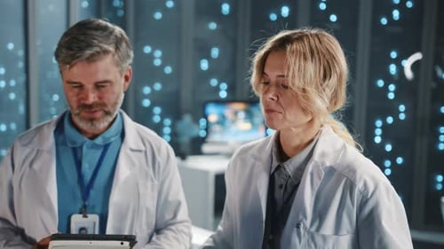 In Scientific Laboratory Two Female Male Scientists Wearing White Coats Checking Treadmill Equipment