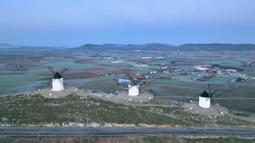 Drone shot of the view of the famous windmills of the town of Consuegra, symbol of Castilla-La Manch