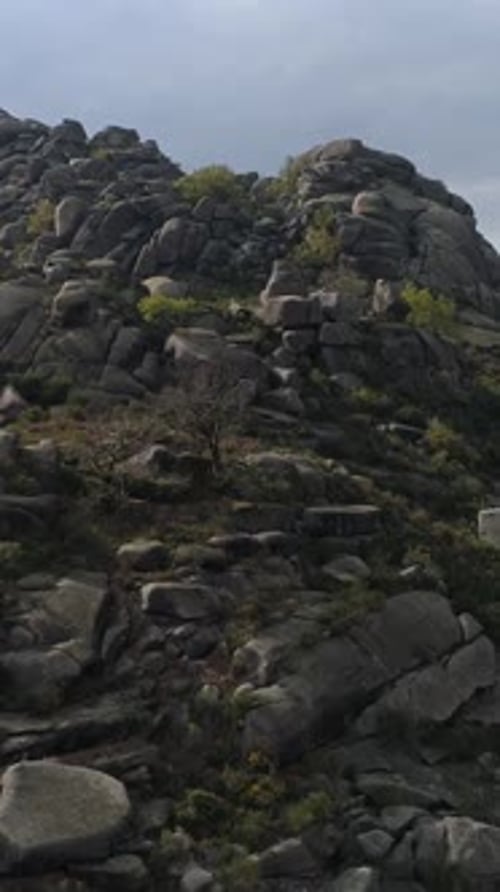 Vertical Video of High Mountains Rocks Formation Aerial View