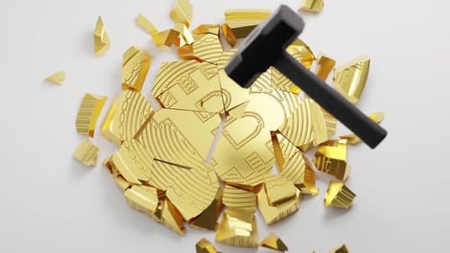Golden Bitcoin Coin Shattering by Hammer on White Background