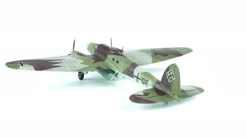 Scale Model Aircraft Displayed in Studio Setting