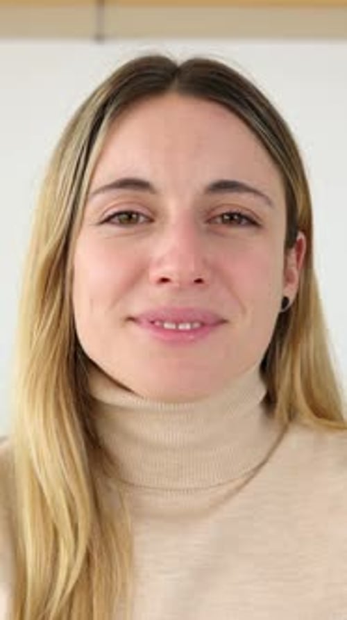 Blonde Woman Smiling Happily In Close Up Portrait