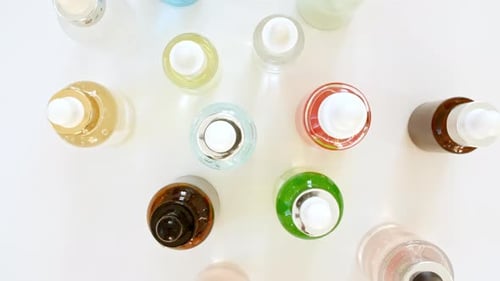 Assorted Colorful Serum Bottles Overhead Product Shot