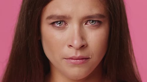 Woman with Tears Streaming Down Her Face