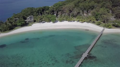 Aerial view of paradise island Koh Kham,backwards from the resort by the beach towards open sea.