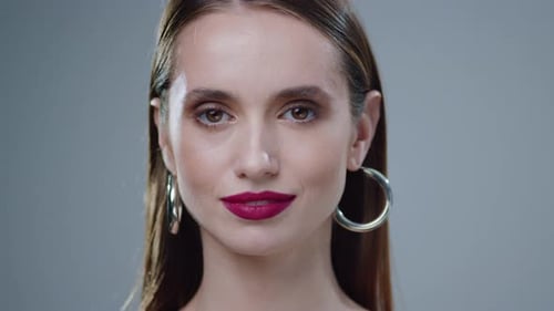 Woman Smiling in Close Up Studio Portrait