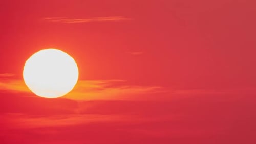 The summer sky was bright with the colors of the sunset, timelapse