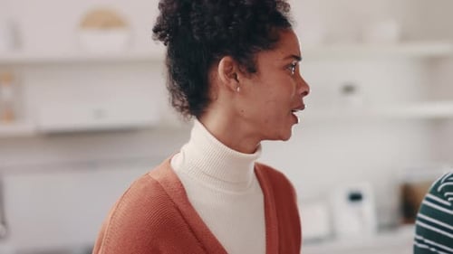 Young Couple Arguing in Modern Kitchen