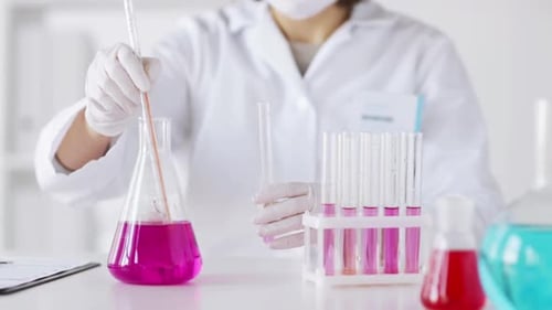 Science, Chemistry, Medicine and People Concept - Close Up of Scientist With