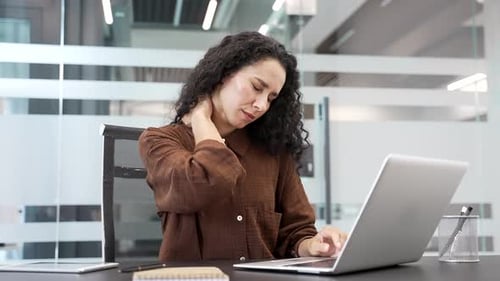 Businesswoman Typing at Laptop, Neck Pain in Office