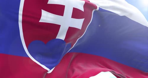 Realistic Slovakia National Flag Waving in Blue Sky
