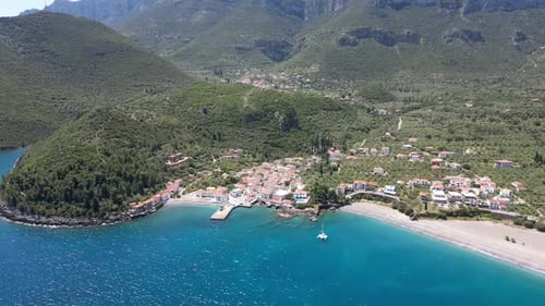 Aerial video from a high view of the small town of Kyparissi, Greece
