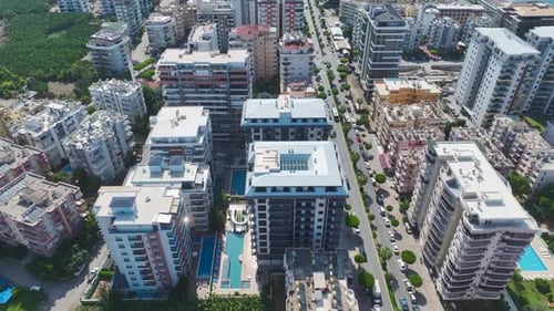 Aerial View Beautiful Residential Complex With Pool and Water Slides By the Mediterranean Sea