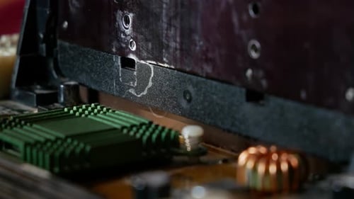 Installing a processor into a computer motherboard slot close-up