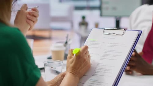 Business People Discuss Employment Benefits in Modern Office