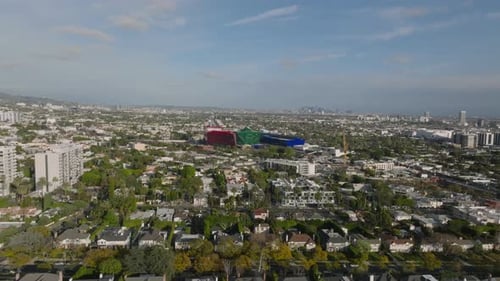 Fly Above Residential District in Large City Rows of Houses Along Streets Significant Colour