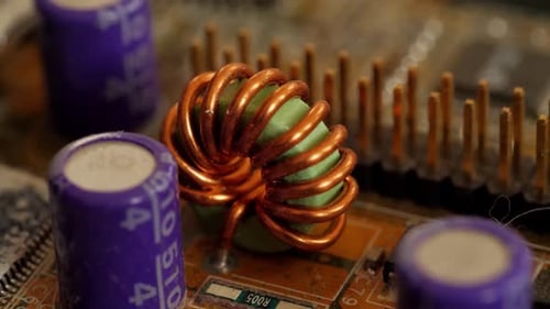 Capacitors and ports on a computer board close-up