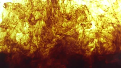 Abstract Golden Brown Ink Swirling and Mixing