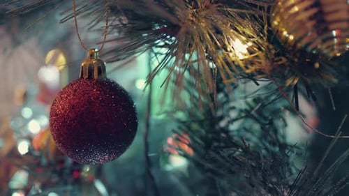 Christmas Tree Close Up with Red and Gold Ornaments
