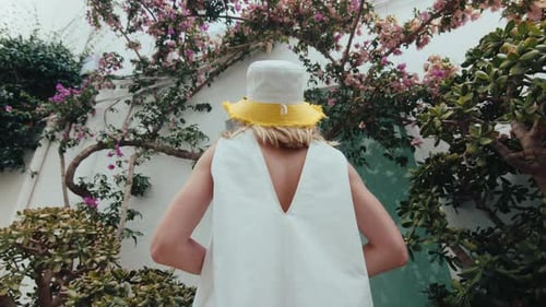 Woman in White Dress Posing Outdoors