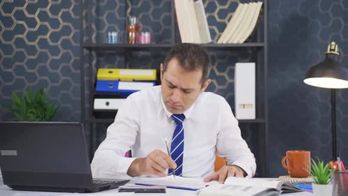 Adult Working at Desk, Confused and Frustrated