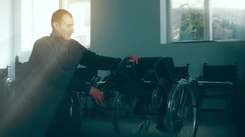 A Disabled Man Assembles a Stroller