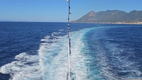 Greek flag on a boat in the Aegean sea