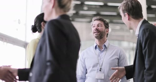 Business Professionals Networking in Corporate Workplace