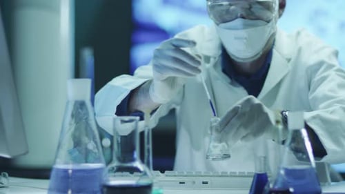 Scientist Conducting Experiments in a Lab