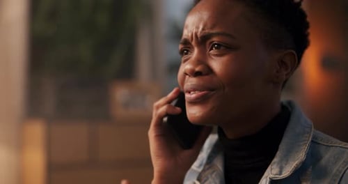 Happy Woman Chatting on Phone Indoors